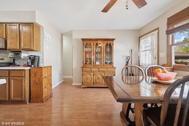 1713 Meadow Ln, Mchenry, IL 60050 - dining room with light wood-style floors and ceiling fan