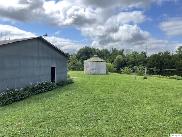 1550 N 2753rd Ln, Loraine, IL 62349 - view of grassy yard with an outbuilding and a pole building
