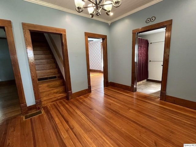 1550 N 2753rd Ln, Loraine, IL 62349 - interior space featuring a chandelier, hardwood / wood-style floors, and crown molding