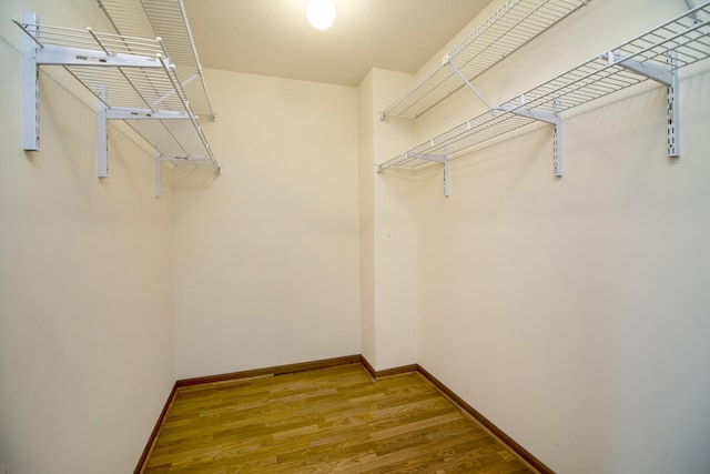 947 Winter Park Dr Unit 947, New Lenox, IL 60451 - walk in closet featuring wood finished floors