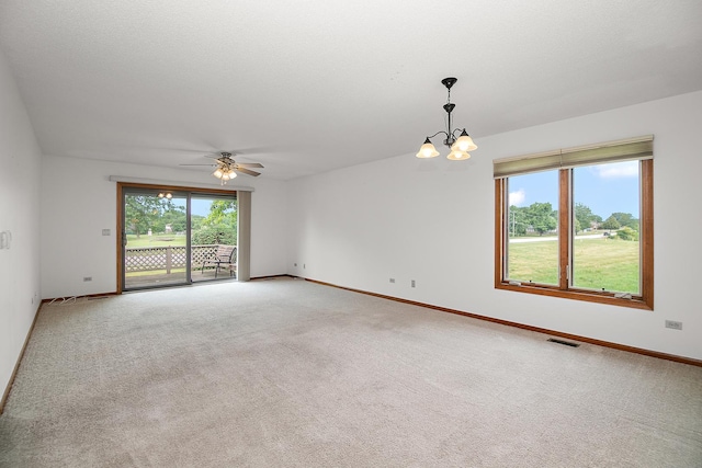 947 Winter Park Dr Unit 947, New Lenox, IL 60451 - unfurnished room featuring a chandelier, light carpet, and ceiling fan