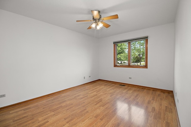 947 Winter Park Dr Unit 947, New Lenox, IL 60451 - unfurnished room featuring light wood-type flooring and ceiling fan