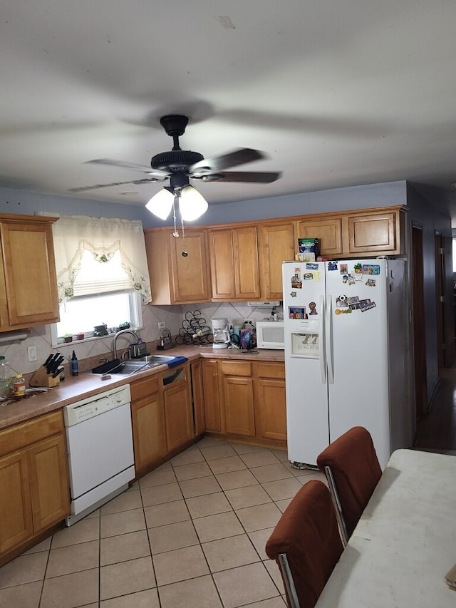 3201 Armitage Ave, Melrose Park, IL 60160 - kitchen featuring white appliances, backsplash, light tile patterned flooring, a ceiling fan, and light countertops