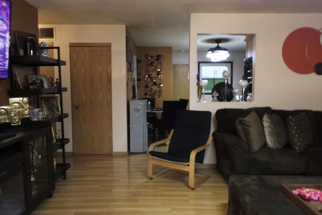 21546 Peterson Ave, Sauk Village, IL 60411 - living room with light wood-style floors