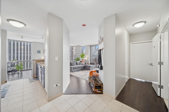 222 N Columbus Dr Unit 3702, Chicago, IL 60601 - corridor featuring baseboards and light tile patterned flooring
