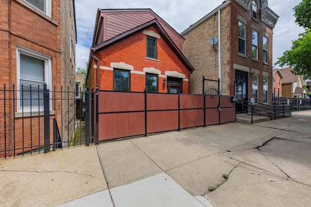 2012 W Coulter St, Chicago, IL 60608 - view of front of property featuring a gate and brick siding