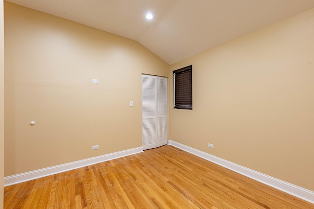 2012 W Coulter St, Chicago, IL 60608 - empty room with vaulted ceiling, light wood-style floors, and recessed lighting