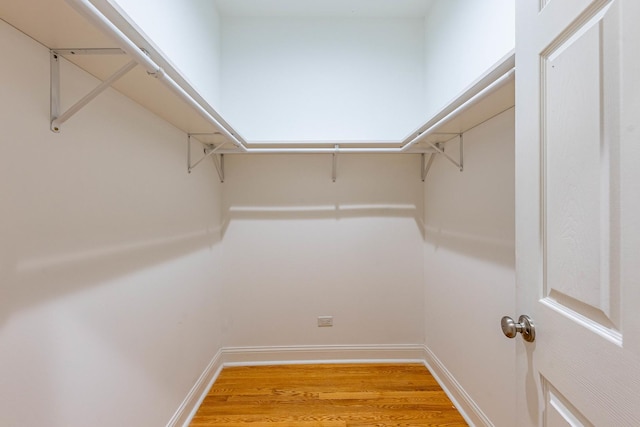 2012 W Coulter St, Chicago, IL 60608 - spacious closet with light wood-style floors