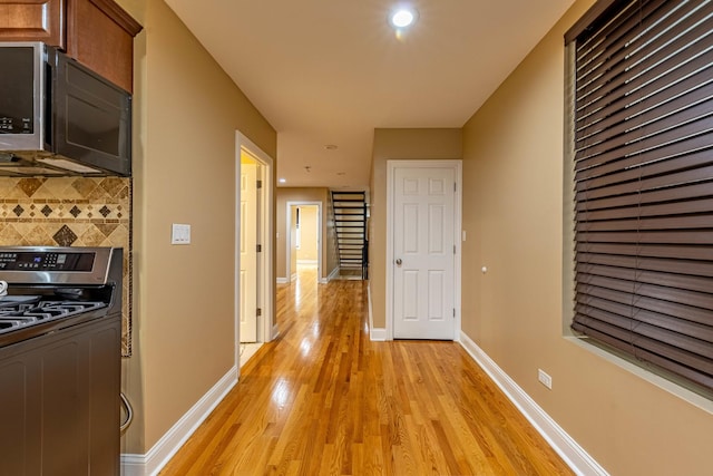 2012 W Coulter St, Chicago, IL 60608 - hallway with light wood finished floors and recessed lighting