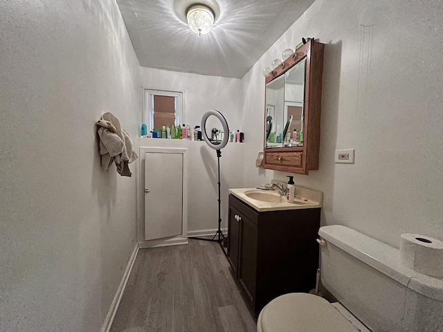 622 N Wisconsin Ave, Villa Park, IL 60181 - half bathroom featuring wood finished floors and vanity