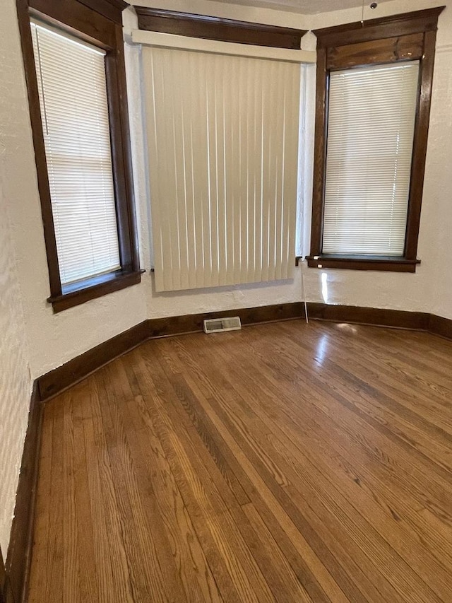 2724 W Flournoy St, Chicago, IL 60624 - empty room featuring wood finished floors and baseboards