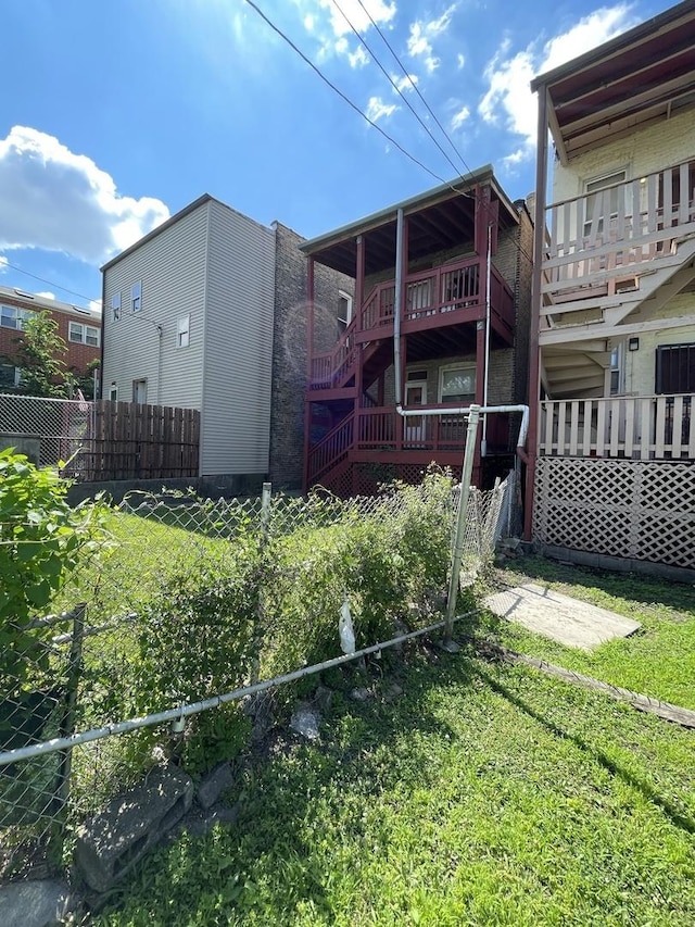 2724 W Flournoy St, Chicago, IL 60624 - rear view of property with a wooden deck