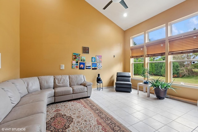 2701 Hamman Way, Aurora, IL 60502 - living room with high vaulted ceiling, tile patterned floors, ceiling fan, and recessed lighting