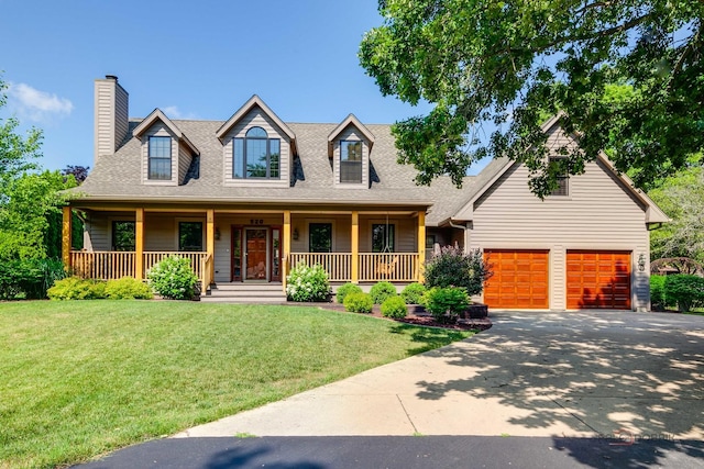 520 Holdridge Ave, Winthrop Harbor, IL 60096 - cape cod-style house featuring roof with shingles, driveway, an attached garage, and a front lawn
