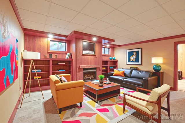 520 Holdridge Ave, Winthrop Harbor, IL 60096 - carpeted living area with a fireplace, crown molding, and wooden walls