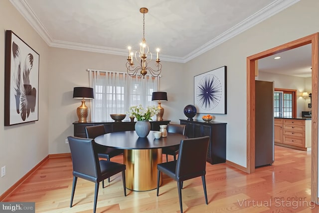 520 Holdridge Ave, Winthrop Harbor, IL 60096 - dining area with a chandelier, light wood-style floors, and ornamental molding