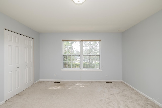 1114 Georgetown Way, Vernon Hills, IL 60061 - unfurnished bedroom featuring carpet and a closet