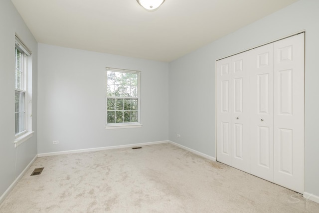 1114 Georgetown Way, Vernon Hills, IL 60061 - unfurnished bedroom featuring carpet floors and a closet