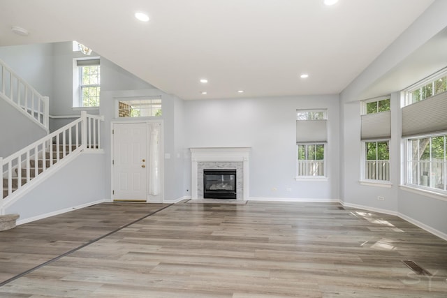 1114 Georgetown Way, Vernon Hills, IL 60061 - unfurnished living room featuring stairway, wood finished floors, recessed lighting, and a fireplace