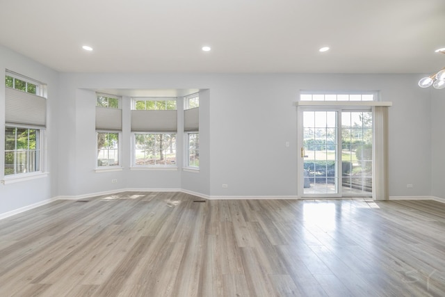 1114 Georgetown Way, Vernon Hills, IL 60061 - unfurnished room with wood finished floors, a chandelier, and recessed lighting