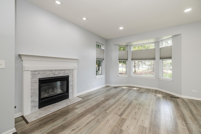 1114 Georgetown Way, Vernon Hills, IL 60061 - unfurnished living room with wood finished floors, a premium fireplace, and recessed lighting
