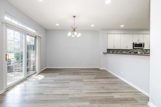 1114 Georgetown Way, Vernon Hills, IL 60061 - unfurnished dining area with recessed lighting, light wood-style floors, and a chandelier