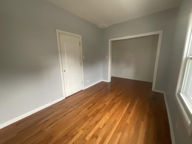 12200 S Lowe Ave, Chicago, IL 60628 - spare room featuring wood finished floors