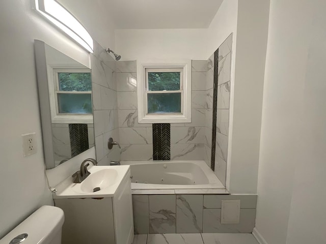 12200 S Lowe Ave, Chicago, IL 60628 - bathroom featuring vanity, a combined bath / shower with jetted tub, and healthy amount of natural light