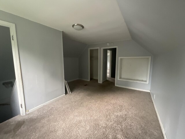 12200 S Lowe Ave, Chicago, IL 60628 - additional living space featuring carpet flooring and vaulted ceiling