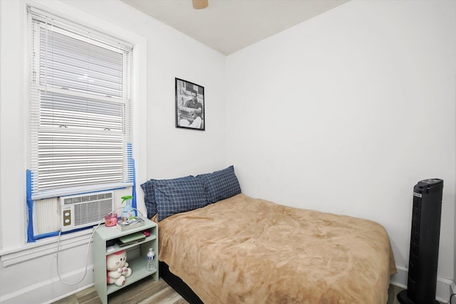 1637 N Keeler Ave, Chicago, IL 60639 - bedroom with wood finished floors and a ceiling fan