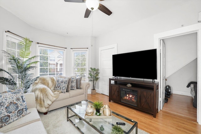 1637 N Keeler Ave, Chicago, IL 60639 - living room featuring light wood-type flooring and a ceiling fan