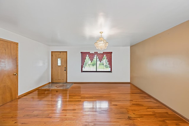 3513 Bordeaux Ct, Hazel Crest, IL 60429 - entrance foyer with a chandelier and wood finished floors