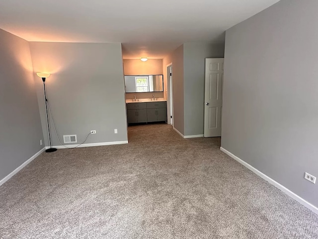 1734 Bishop Way, Mundelein, IL 60060 - unfurnished living room featuring carpet and baseboards