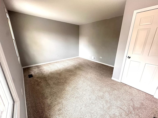 1734 Bishop Way, Mundelein, IL 60060 - carpeted spare room with baseboards