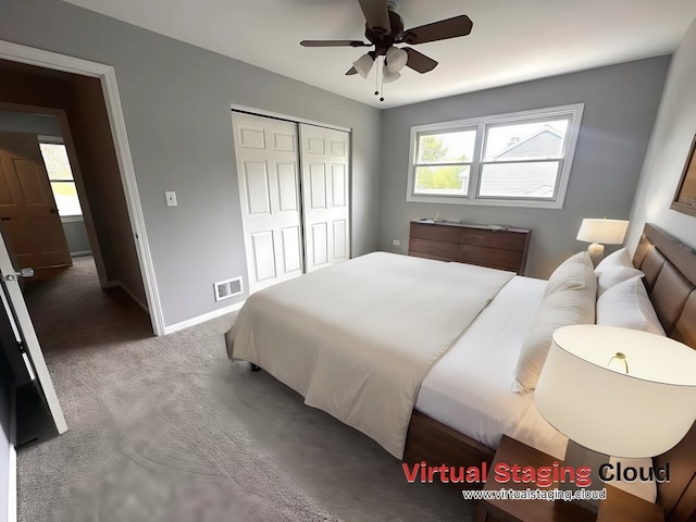 1734 Bishop Way, Mundelein, IL 60060 - bedroom featuring a closet, carpet, and a ceiling fan
