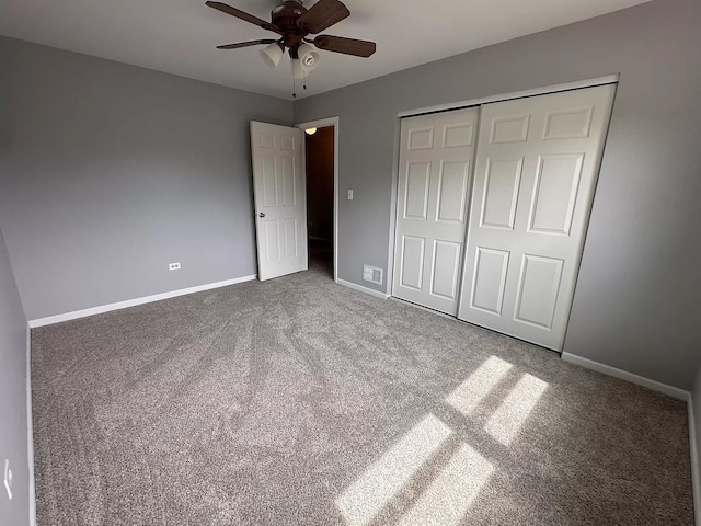 1734 Bishop Way, Mundelein, IL 60060 - unfurnished bedroom featuring carpet floors, a closet, and a ceiling fan