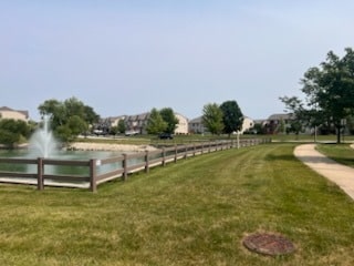 8310 Auburn Ln, Frankfort, IL 60423 - view of community with a yard and a water view