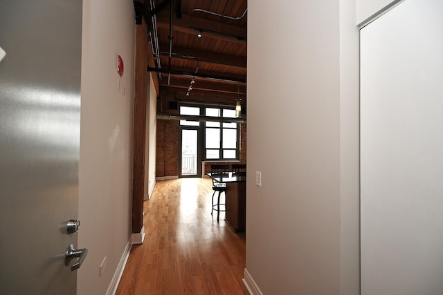 770 W Gladys Ave Unit 606, Chicago, IL 60661 - hallway with wood finished floors and a wood ceiling with exposed beams