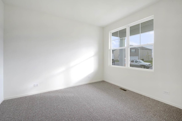 1813 Overland Dr, Plainfield, IL 60586 - unfurnished room featuring carpet flooring and baseboards