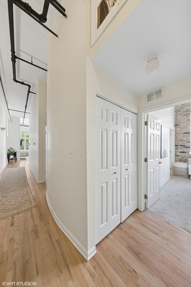 1907 N Milwaukee Ave Unit 307, Chicago, IL 60647 - hall featuring light wood-style floors