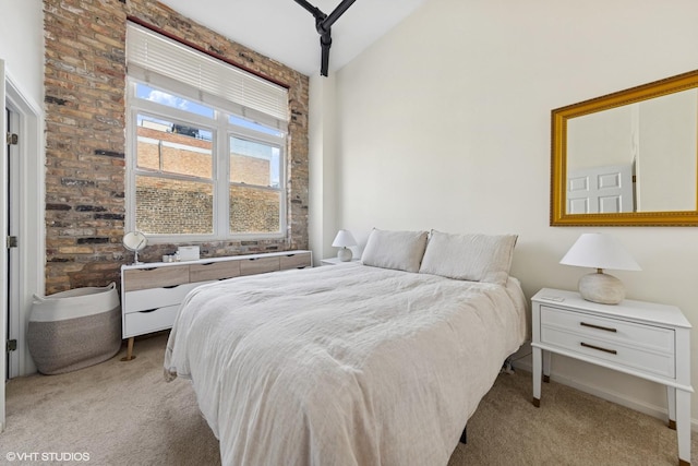 1907 N Milwaukee Ave Unit 307, Chicago, IL 60647 - bedroom featuring light carpet and vaulted ceiling