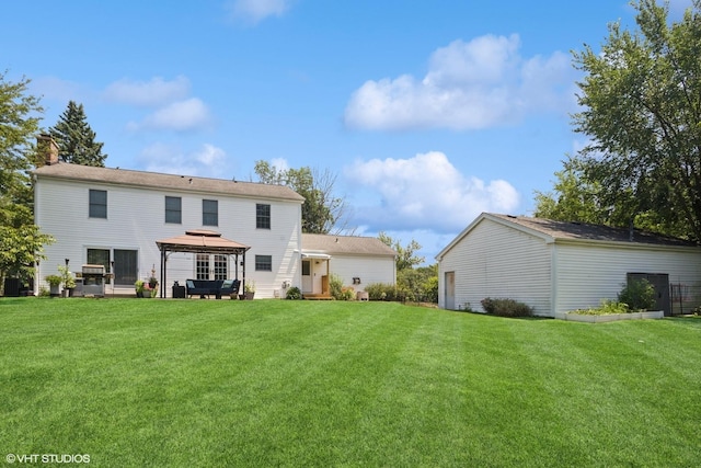 523 N Ela Rd, Barrington, IL 60010 - rear view of property featuring a gazebo, a lawn, and a chimney