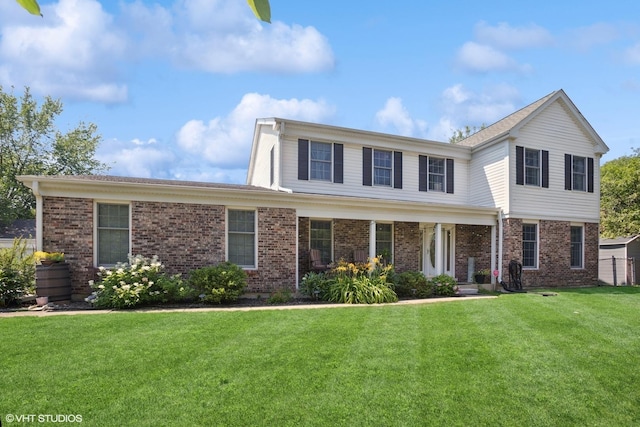 523 N Ela Rd, Barrington, IL 60010 - view of front of house featuring brick siding and a front lawn