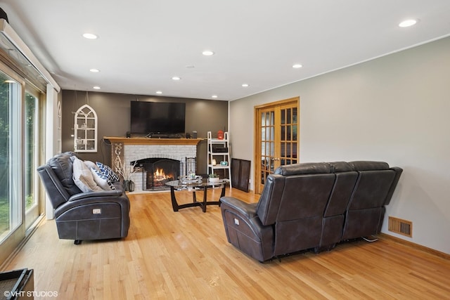 523 N Ela Rd, Barrington, IL 60010 - living room featuring light wood finished floors, recessed lighting, and a fireplace