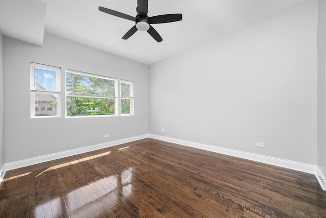 4426 S Artesian Ave, Chicago, IL 60632 - empty room with dark wood-type flooring and ceiling fan