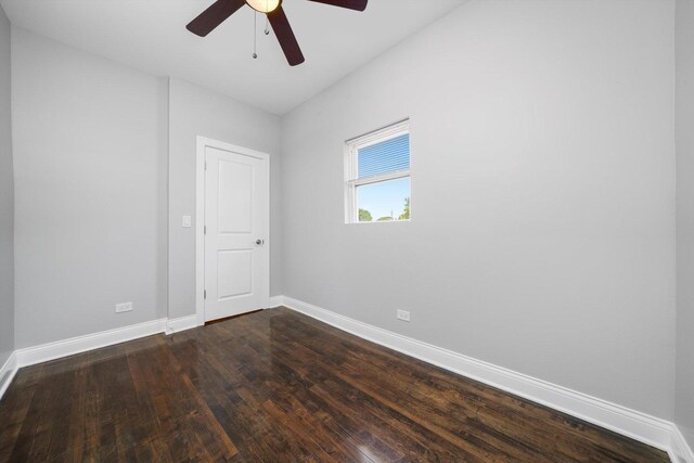 4426 S Artesian Ave, Chicago, IL 60632 - spare room featuring dark wood finished floors and ceiling fan