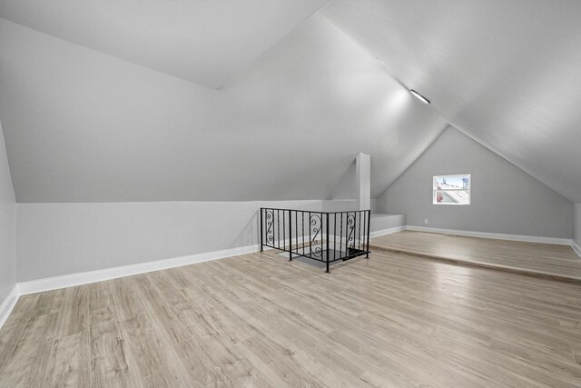 4426 S Artesian Ave, Chicago, IL 60632 - additional living space featuring vaulted ceiling and wood finished floors