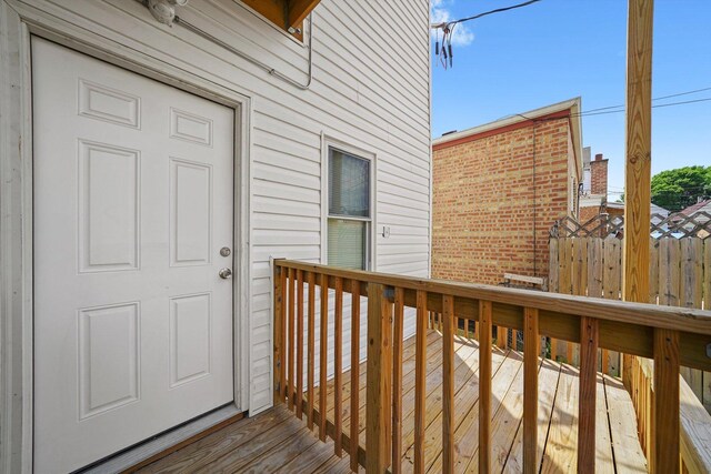 4426 S Artesian Ave, Chicago, IL 60632 - view of exterior entry featuring a deck