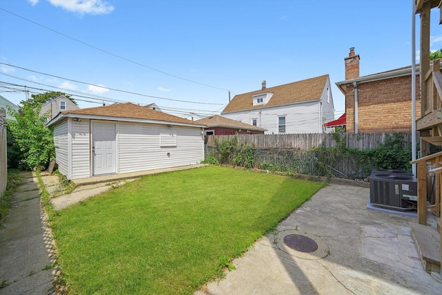 4426 S Artesian Ave, Chicago, IL 60632 - view of yard featuring a patio and an outbuilding