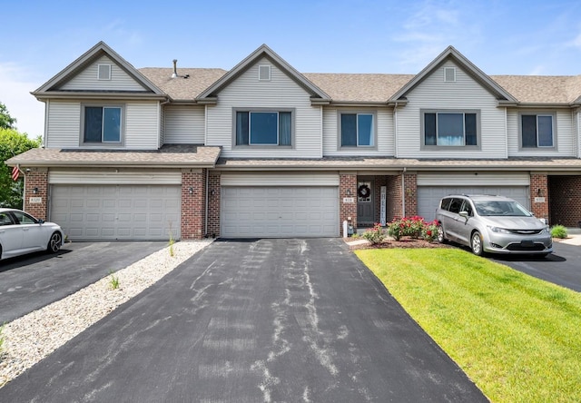 8331 W Chestnut Ct, Frankfort, IL 60423 - traditional-style home with brick siding, a garage, a front yard, a shingled roof, and driveway
